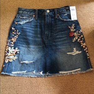 Floral embroidered ripped jean skirt